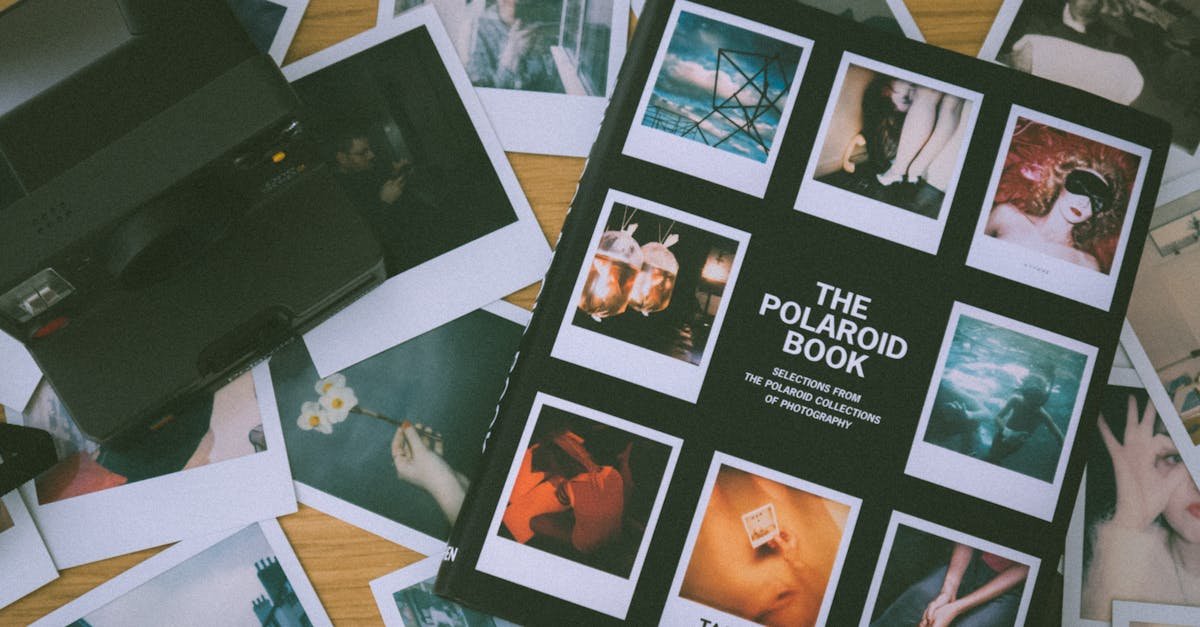 Collection of vintage Polaroid photos with an instant film camera on a wooden surface.