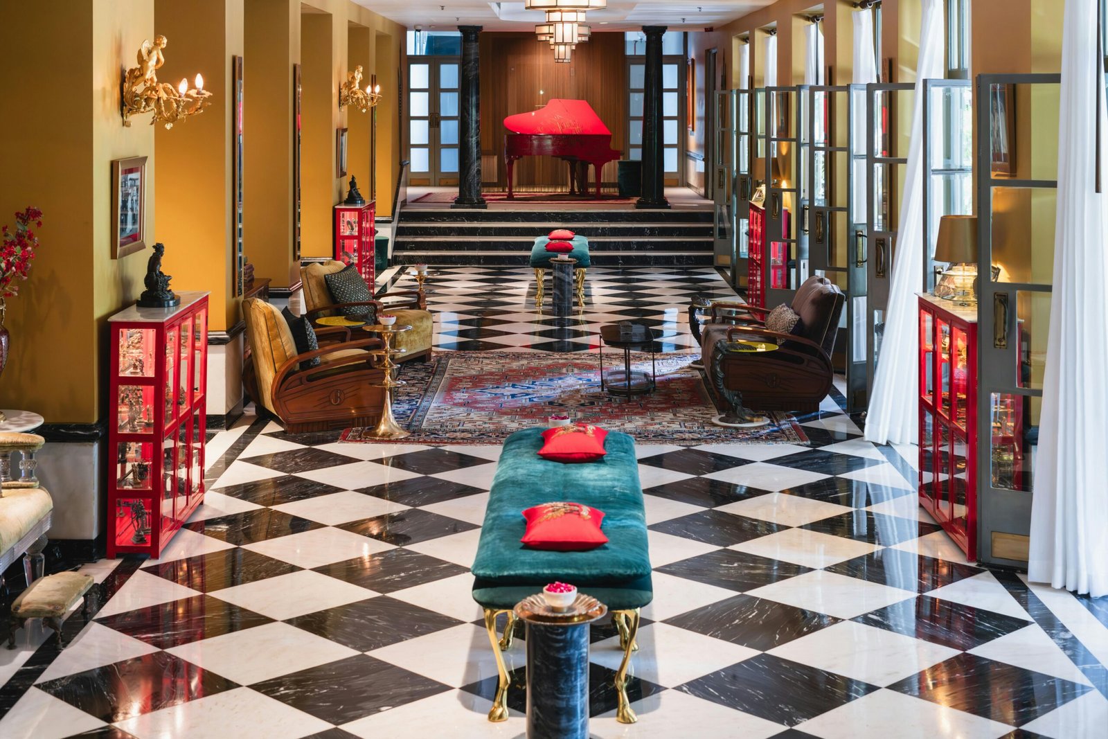 Luxurious hotel lobby in Bikaner, Rajasthan featuring chic interiors and a grand piano.
